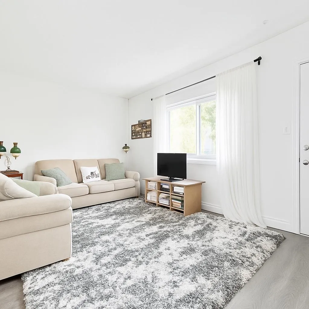 Photo 2 of Unit 36, 185 Denistoun Street, Welland, Broadway — HOMEH