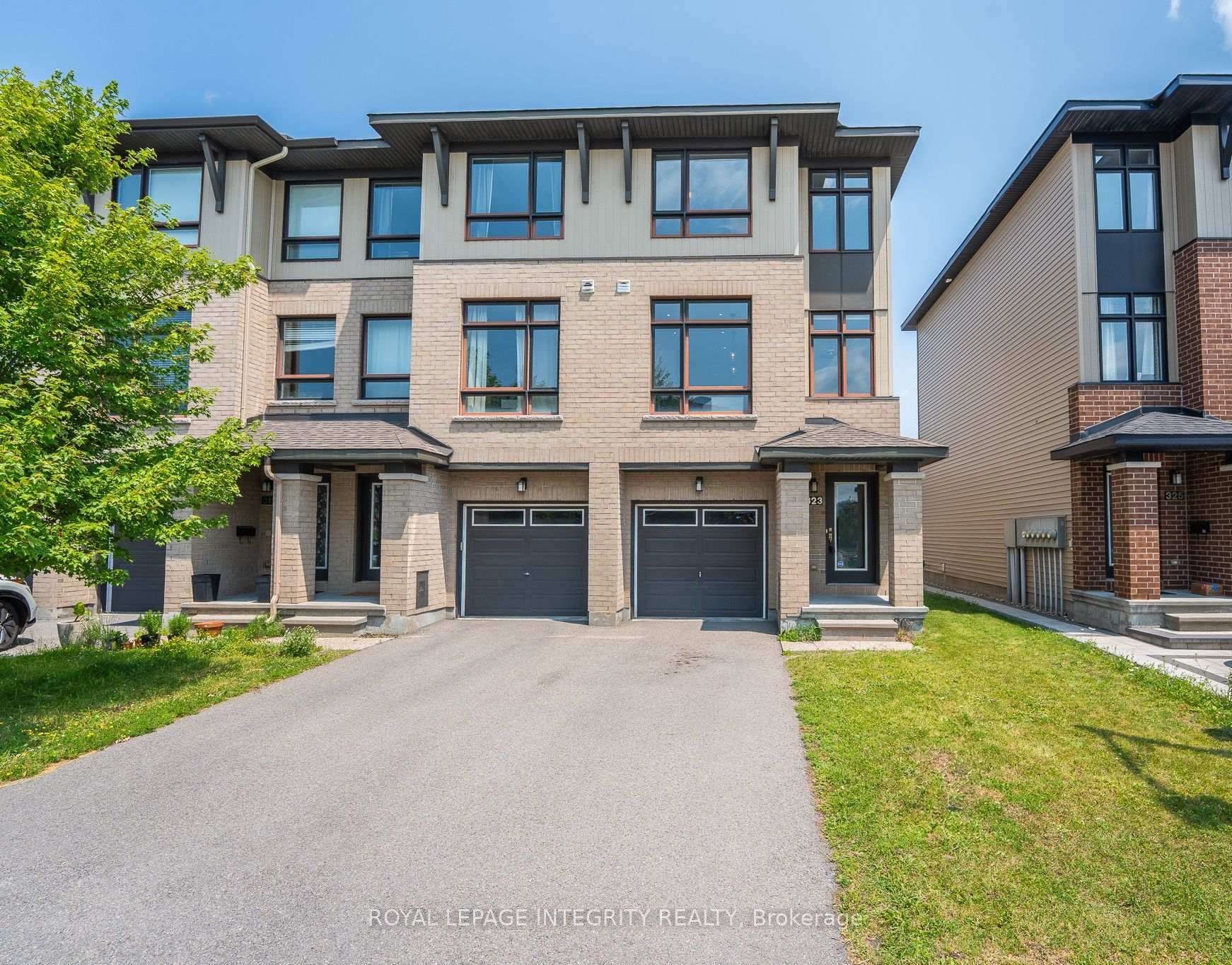 Front of 323 Twinflower Way