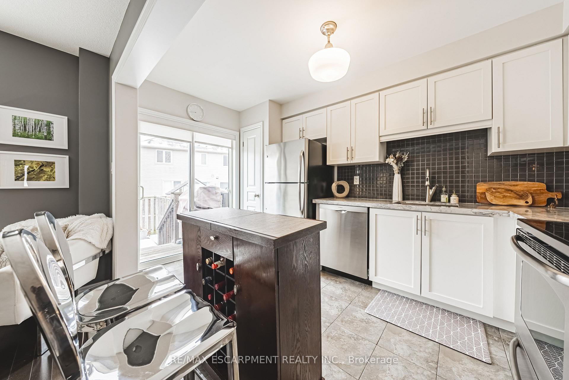 Photo 11 of Unit 73, 222 Fall Fair Way, Hamilton, Binbrook — HOMEH