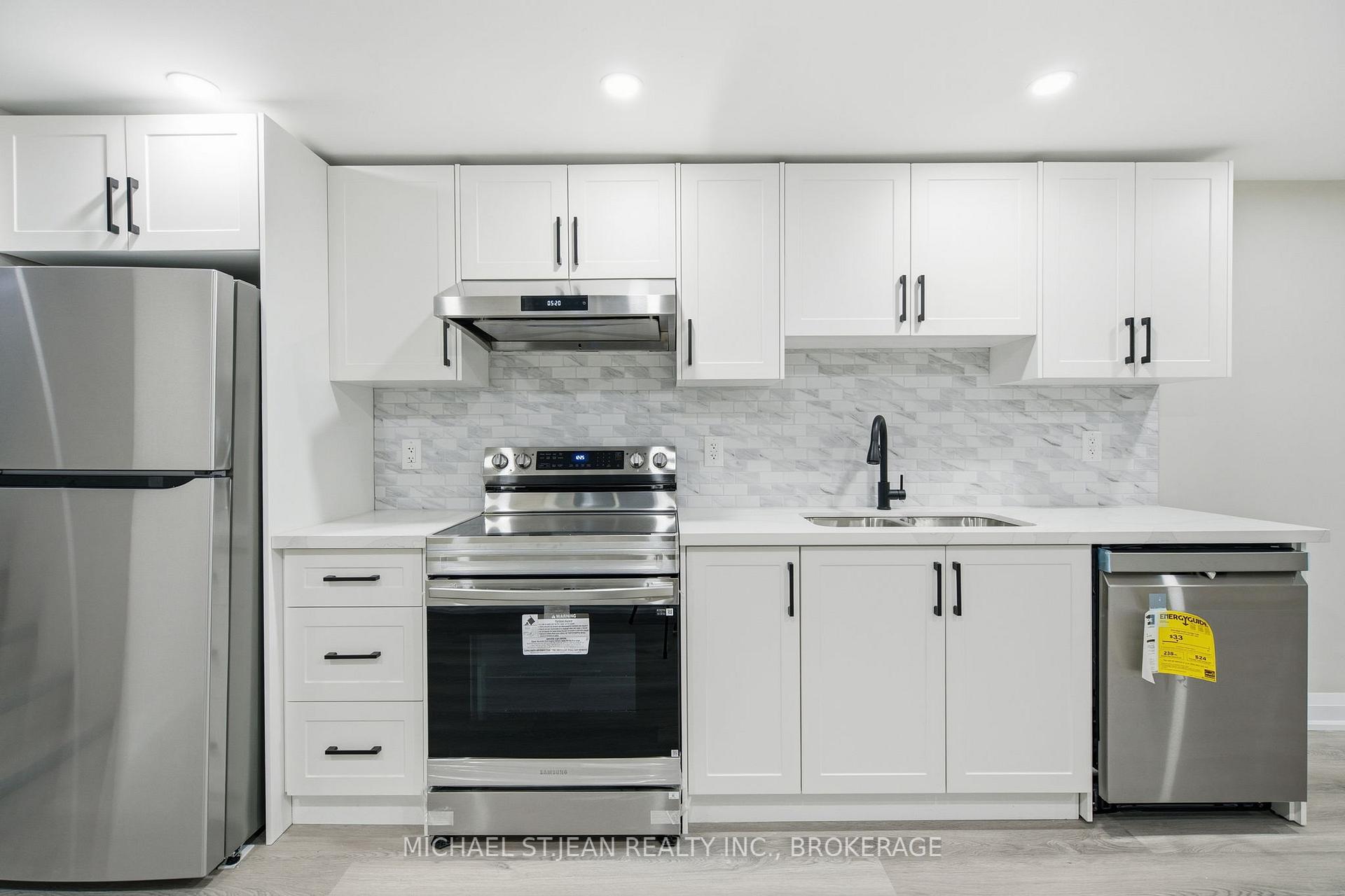 Photo 2 of Unit 1, 489 Cannon Street E, Hamilton, Gibson — HOMEH