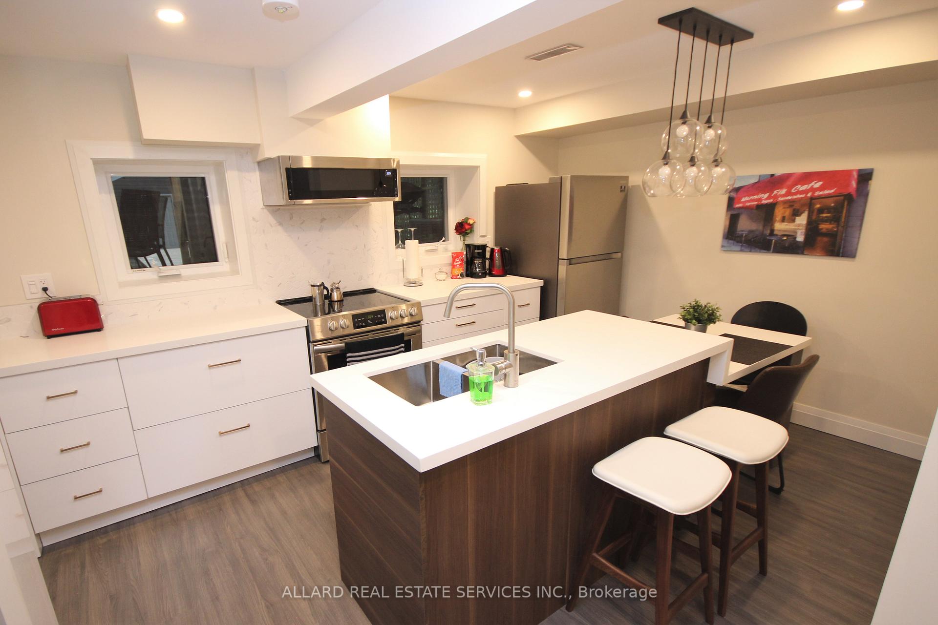 Photo 10 of 361 Rhodes Avenue, Toronto, Greenwood-Coxwell — HOMEH
