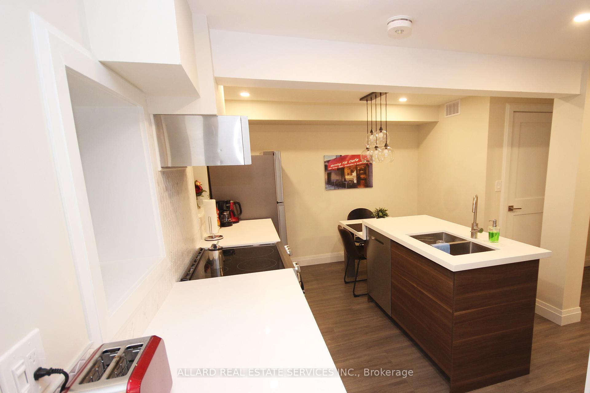 Photo 15 of 361 Rhodes Avenue, Toronto, Greenwood-Coxwell — HOMEH