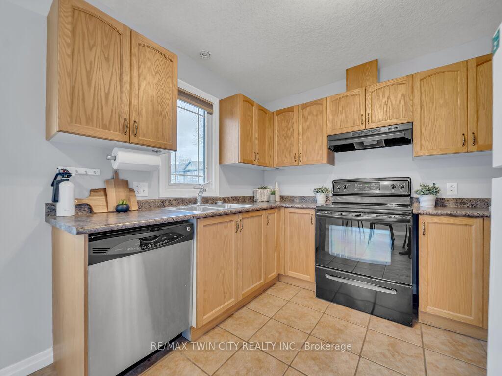 Photo 5 of Unit #11, 535 Windflower Crescent, Kitchener, Larentian West — HOMEH