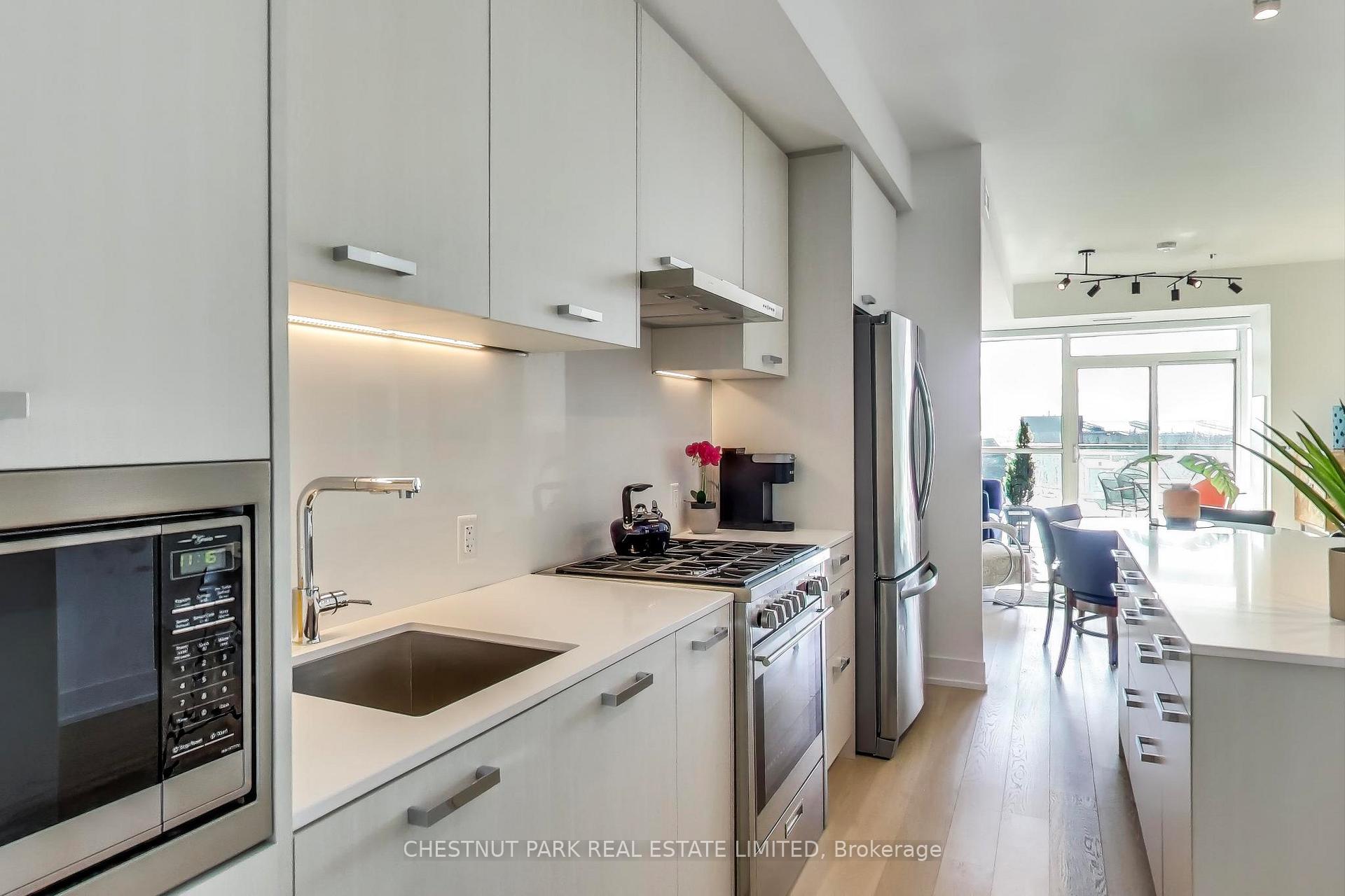 Photo 10 of Unit 604, 1331 Queen Street E, Toronto, Greenwood-Coxwell — HOMEH