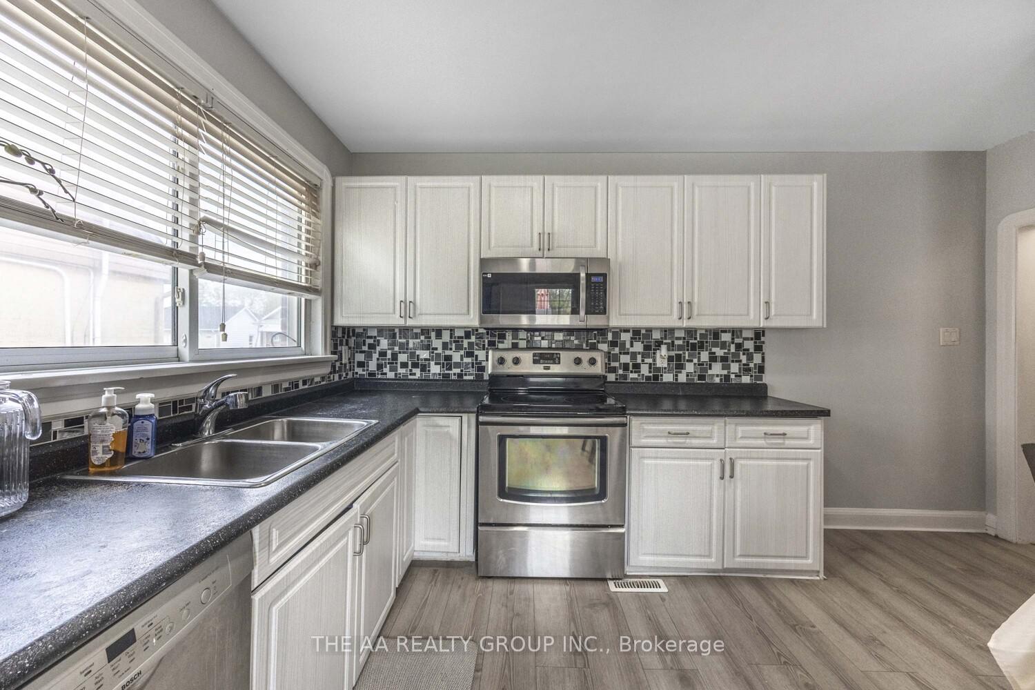 Photo 4 of 233 McNaughton Avenue, Oshawa, Central — HOMEH