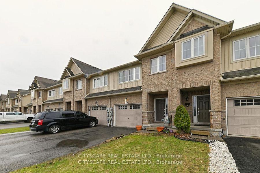 Front of 128 Palacebeach Trail