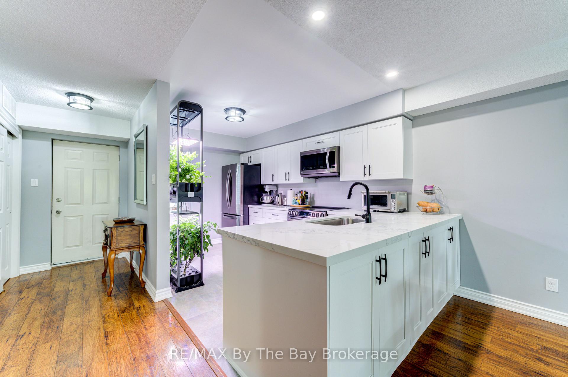 Photo 3 of Unit 6, 10 Mulligan Lane, Wasaga Beach — HOMEH