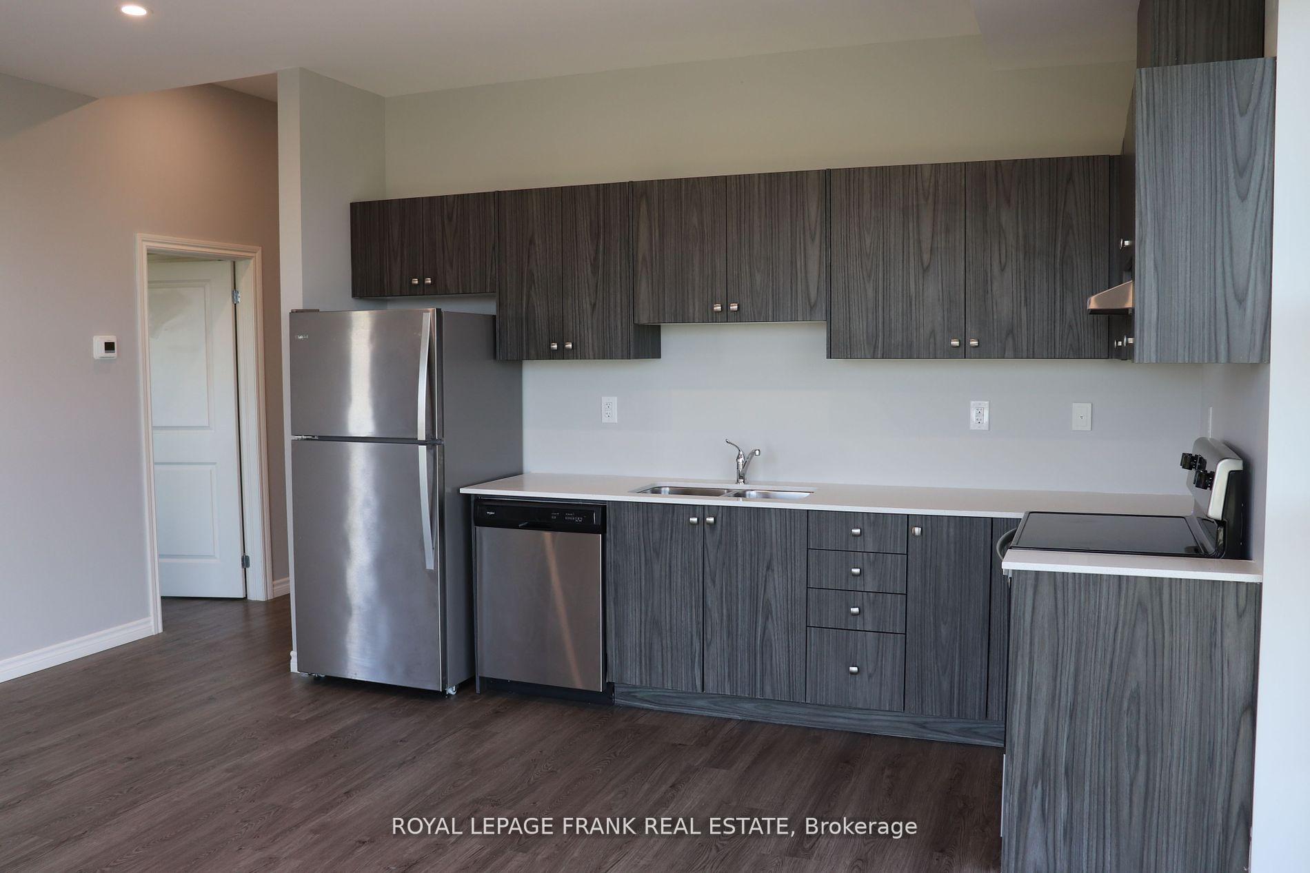 Photo 4 of Unit D, 513 Dundas Street, Whitby, Downtown Whitby — HOMEH