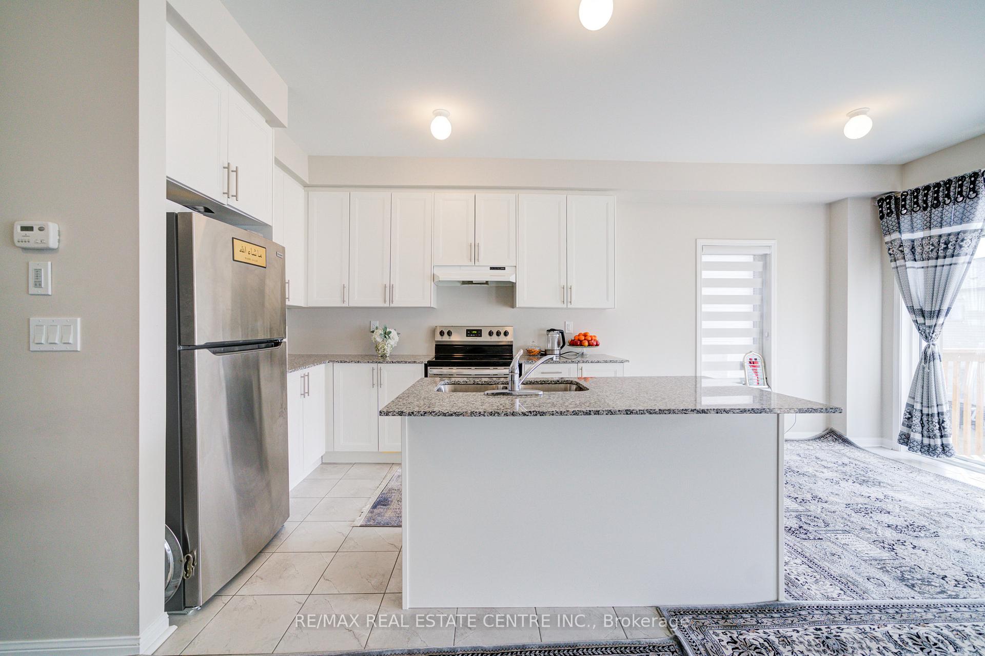 Photo 3 of 319 Windfields Farm Drive E, Oshawa, Windfields — HOMEH