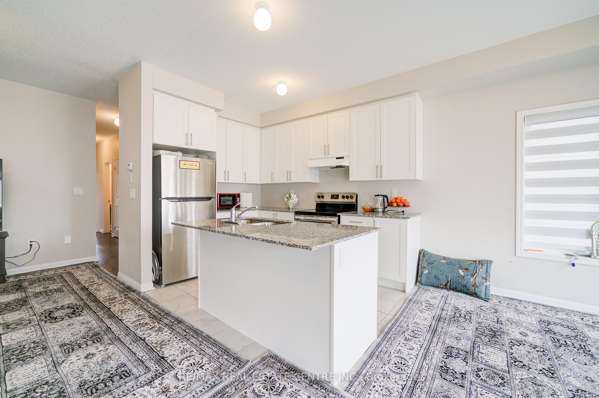 Photo 4 of 319 Windfields Farm Drive E, Oshawa, Windfields — HOMEH