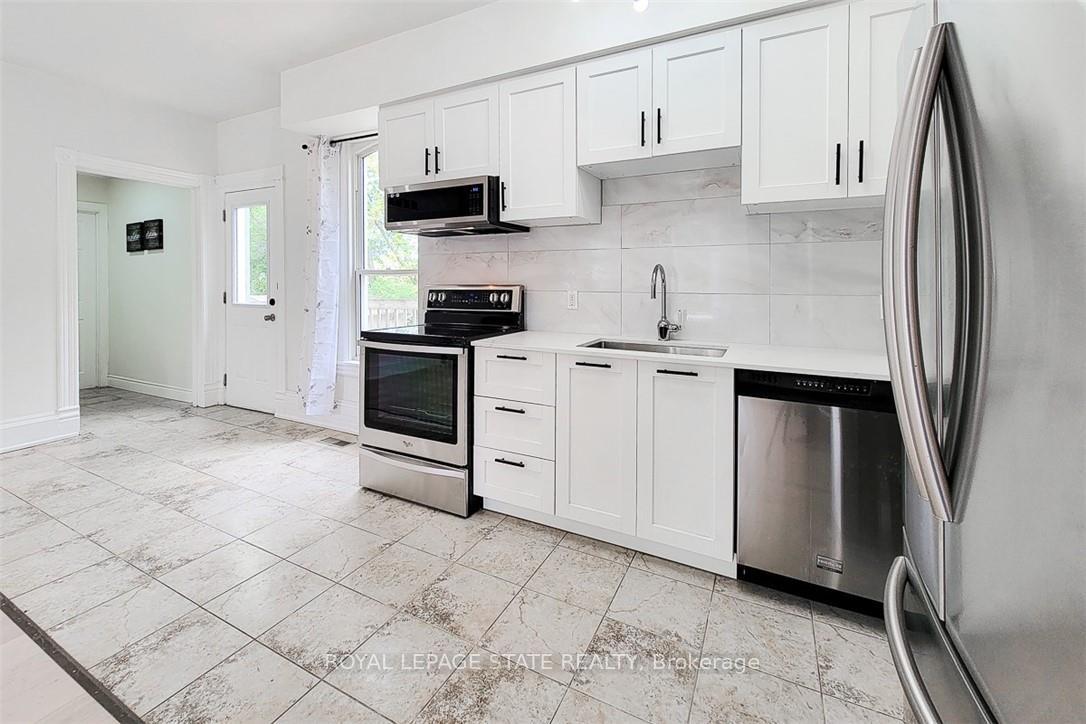 Photo 3 of Unit Main, 115 Main Street W, Grimsby, Grimsby West — HOMEH