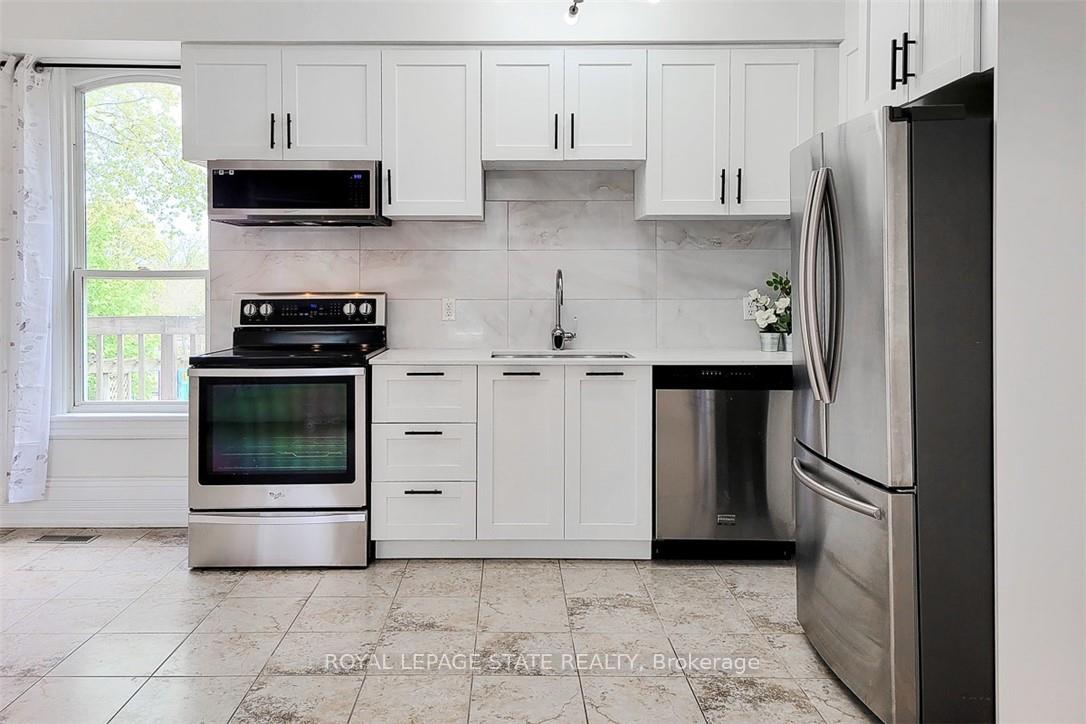 Photo 4 of Unit Main, 115 Main Street W, Grimsby, Grimsby West — HOMEH