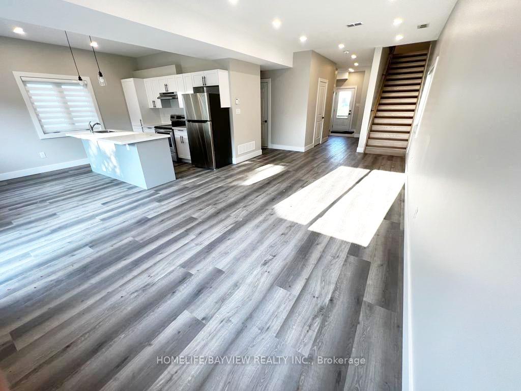 Photo 3 of Unit Main & 2nd, 162 Penetanguishene Road, Barrie, Grove East — HOMEH