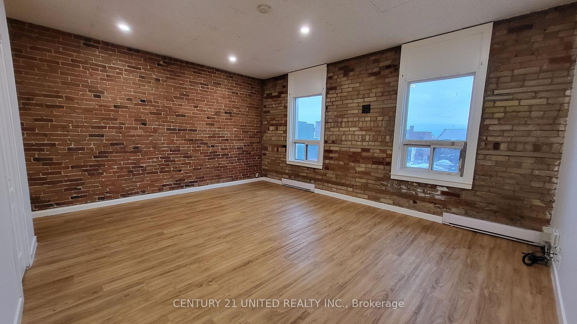 Photo 2 of Unit 5, 174.5 Hunter Street W, Peterborough, Town Ward 3 — HOMEH