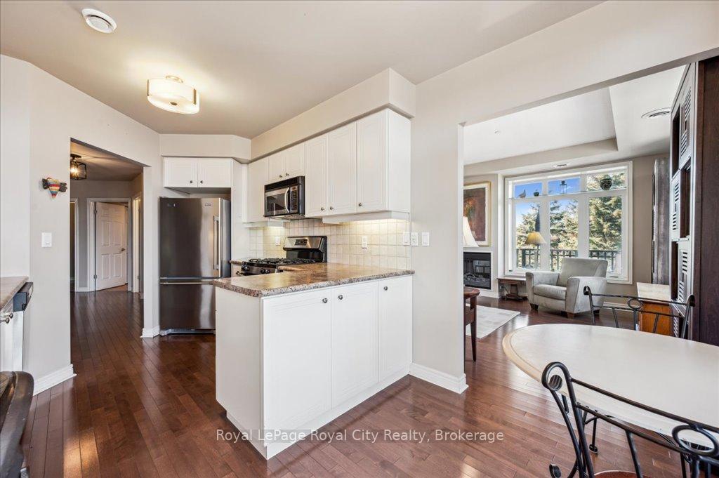 Photo 11 of Unit 212, 71 Bayberry Drive, Guelph, Village By The Arboretum — HOMEH