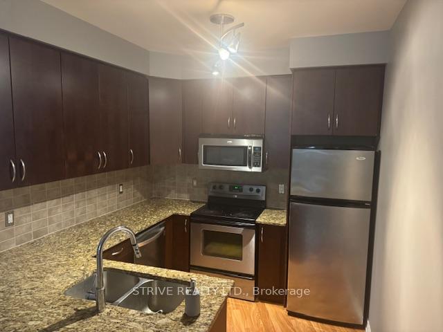 Photo 12 of Unit 417, 9225 Jane Street, Vaughan, Maple — HOMEH