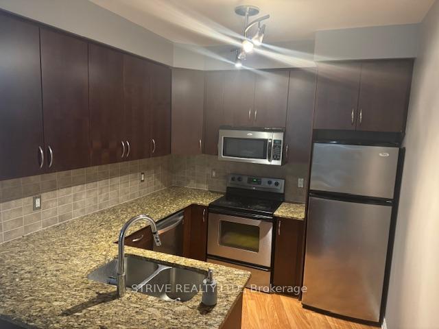 Photo 5 of Unit 417, 9225 Jane Street, Vaughan, Maple — HOMEH