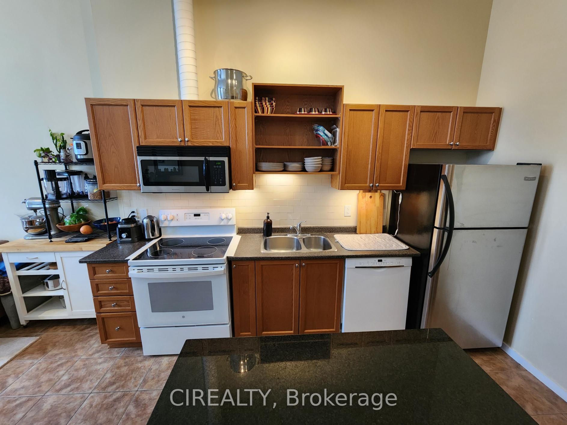 Photo 3 of Unit 424, 410 King Street W, Kitchener — HOMEH