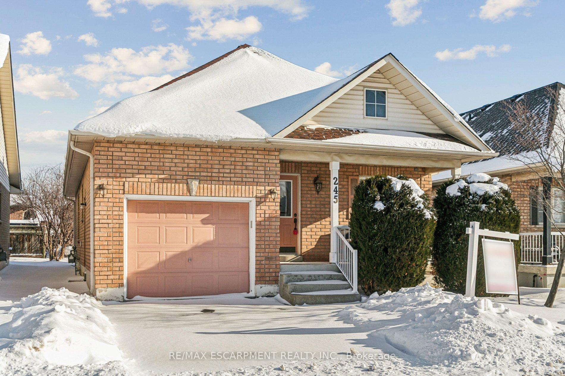 Front of 245 Centennial Forest Drive