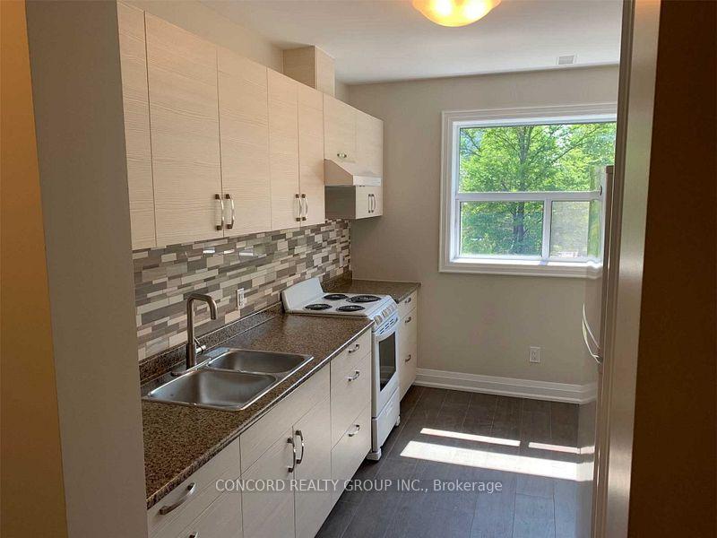 Photo 3 of Unit 4, 19 Louisa Street, Etobicoke, Mimico — HOMEH