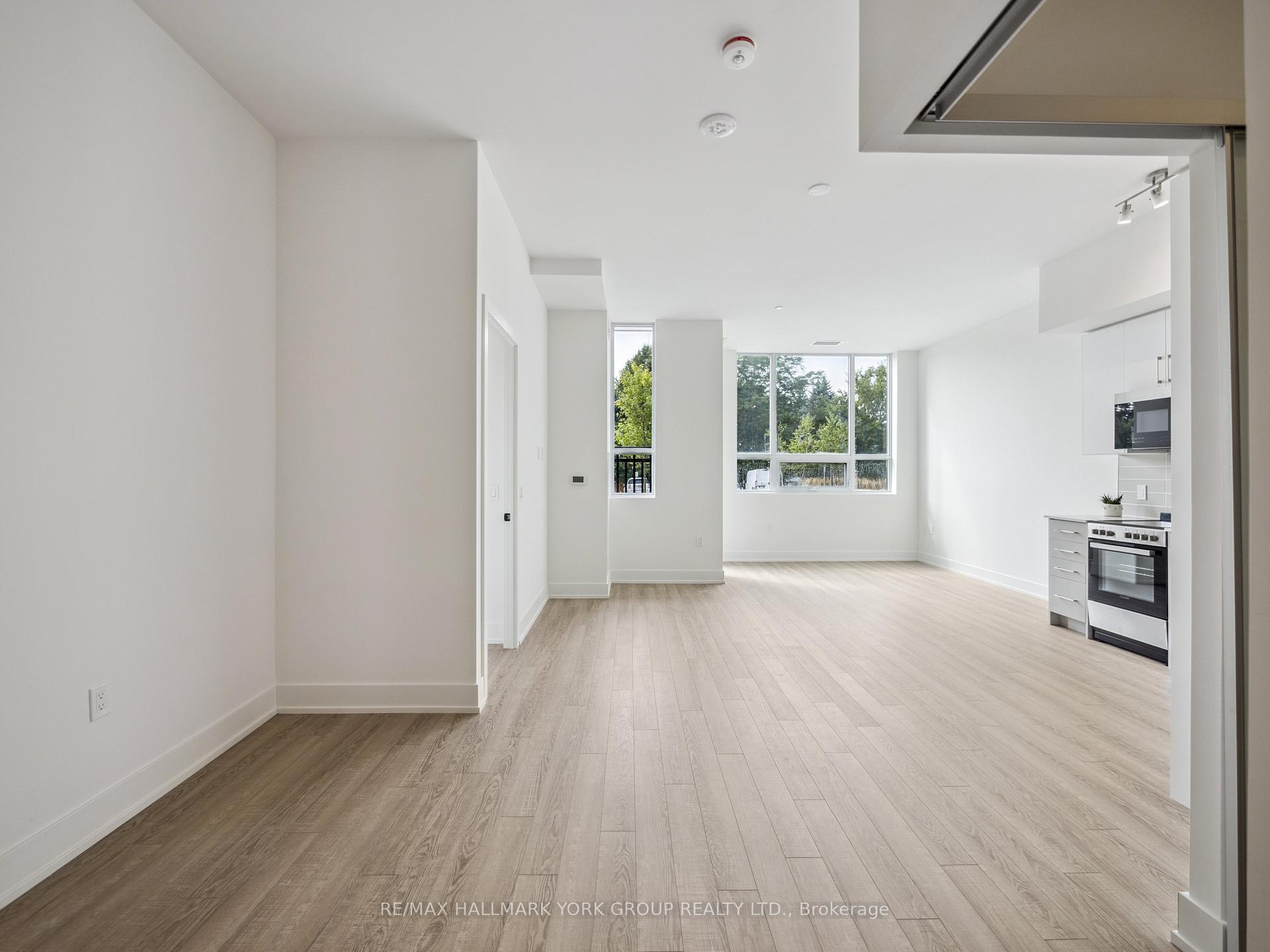 Photo 3 of Unit 104, 2075 King Road, King, King City — HOMEH