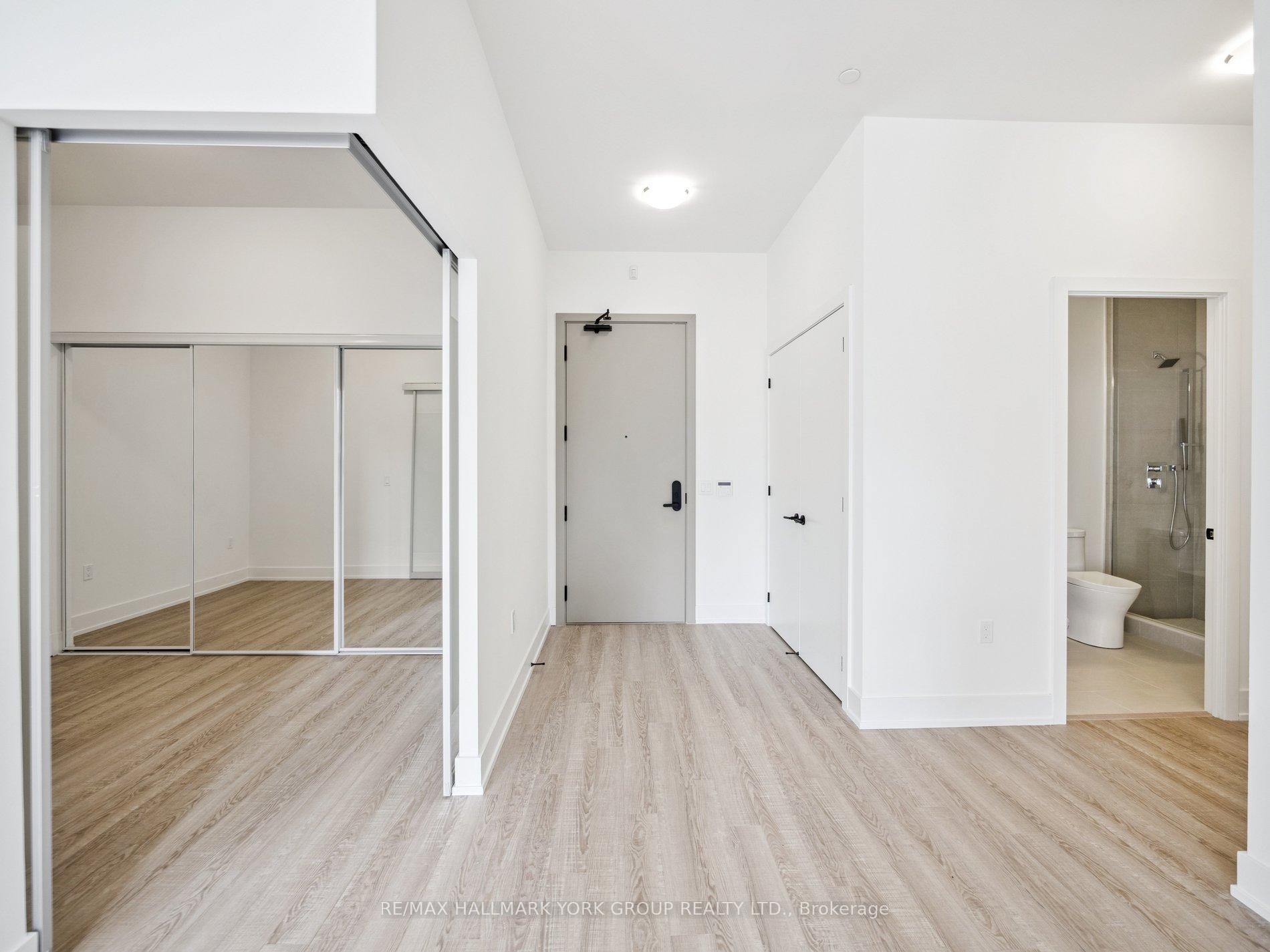 Photo 4 of Unit 104, 2075 King Road, King, King City — HOMEH