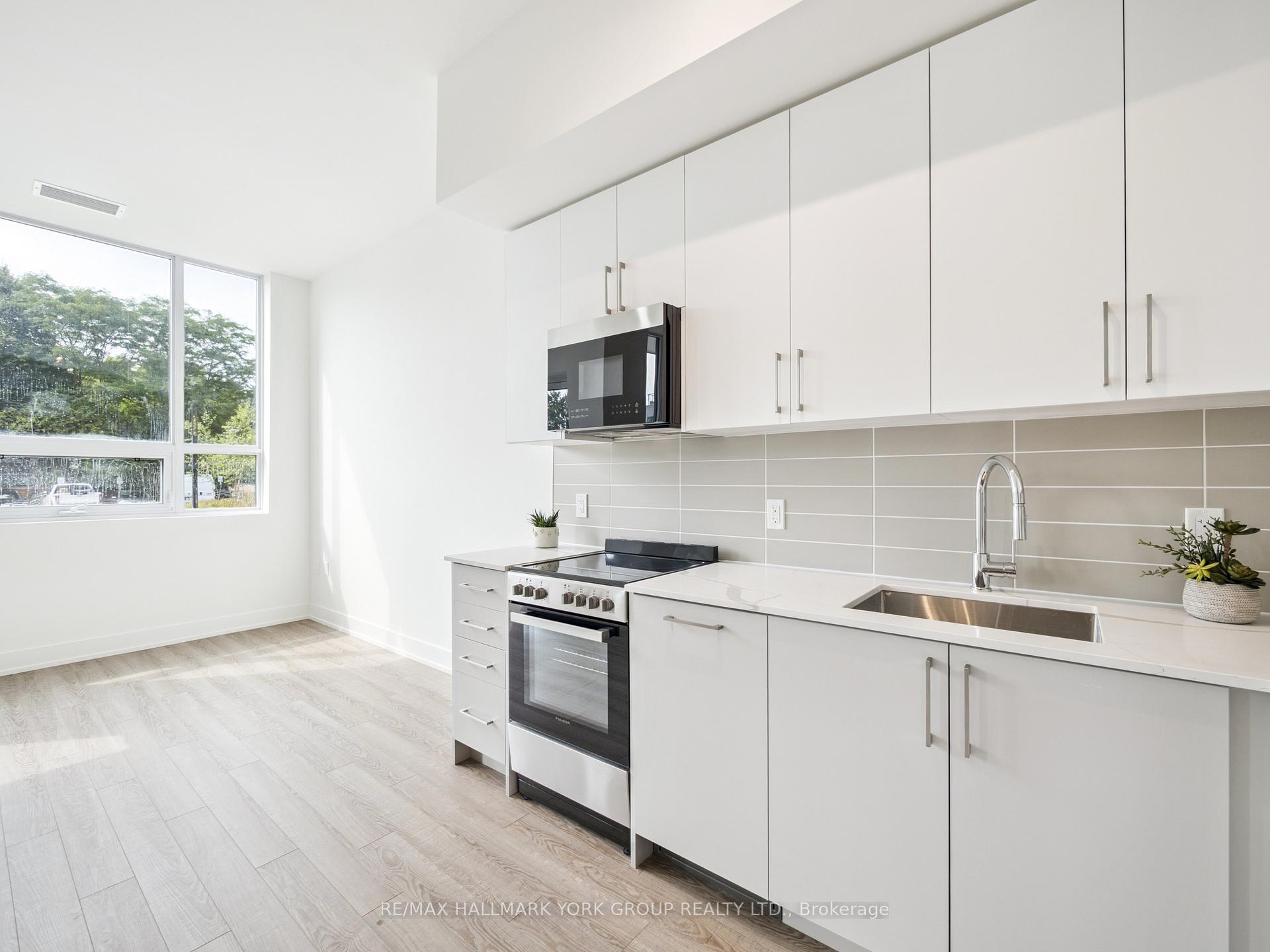 Photo 30 of Unit 104, 2075 King Road, King, King City — HOMEH