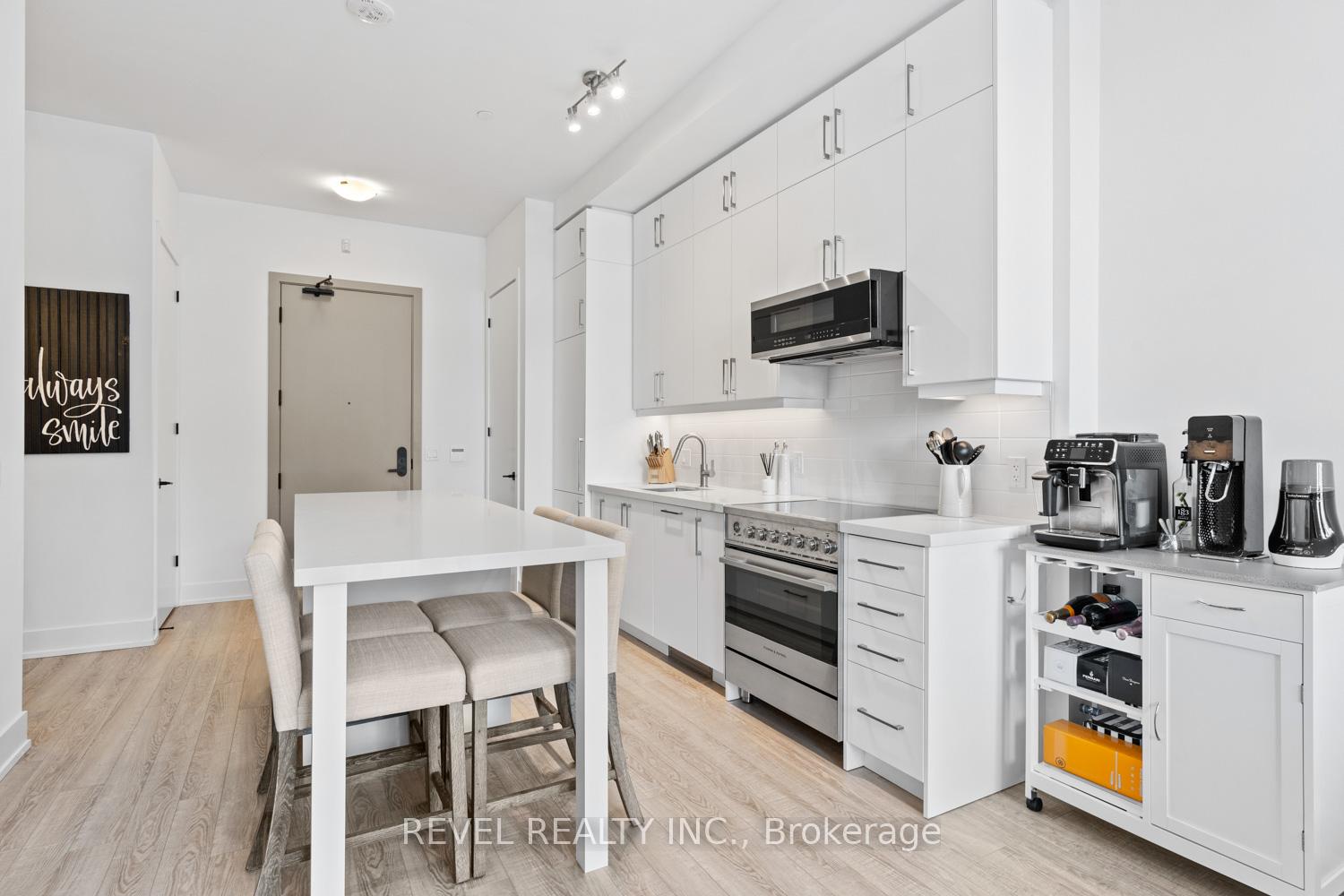 Photo 3 of Unit 123, 2075 King Rd, King, King City — HOMEH