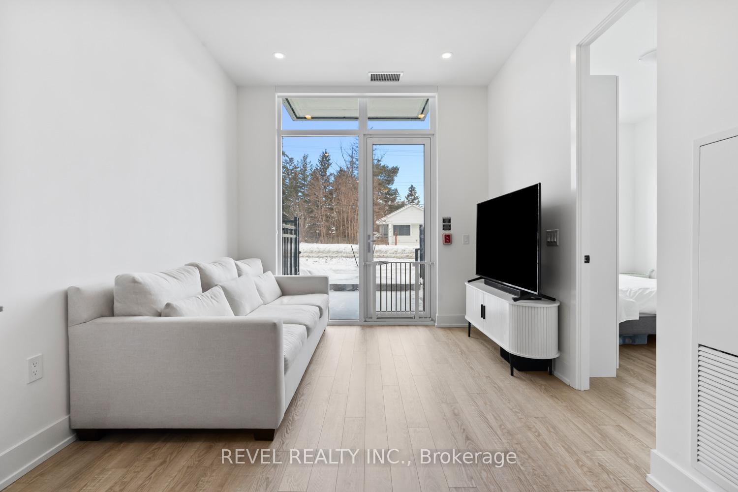 Photo 5 of Unit 123, 2075 King Rd, King, King City — HOMEH