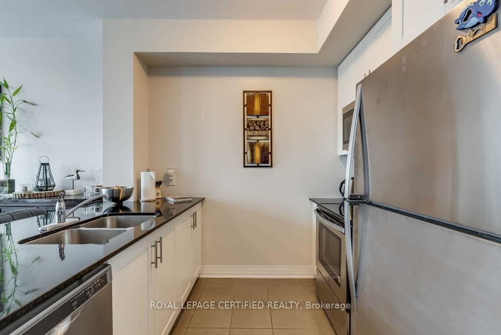 Photo 5 of Unit 407, 10 Concord Place, Grimsby, Grimsby Beach — HOMEH