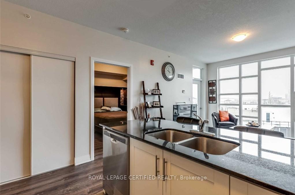 Photo 4 of Unit 407, 10 Concord Place, Grimsby, Grimsby Beach — HOMEH
