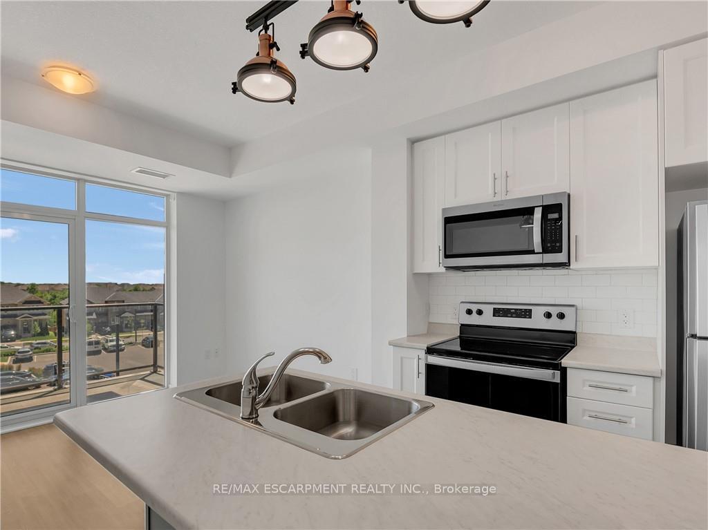 Photo 25 of Unit 319, 450 Dundas Street E, Hamilton, Waterdown — HOMEH