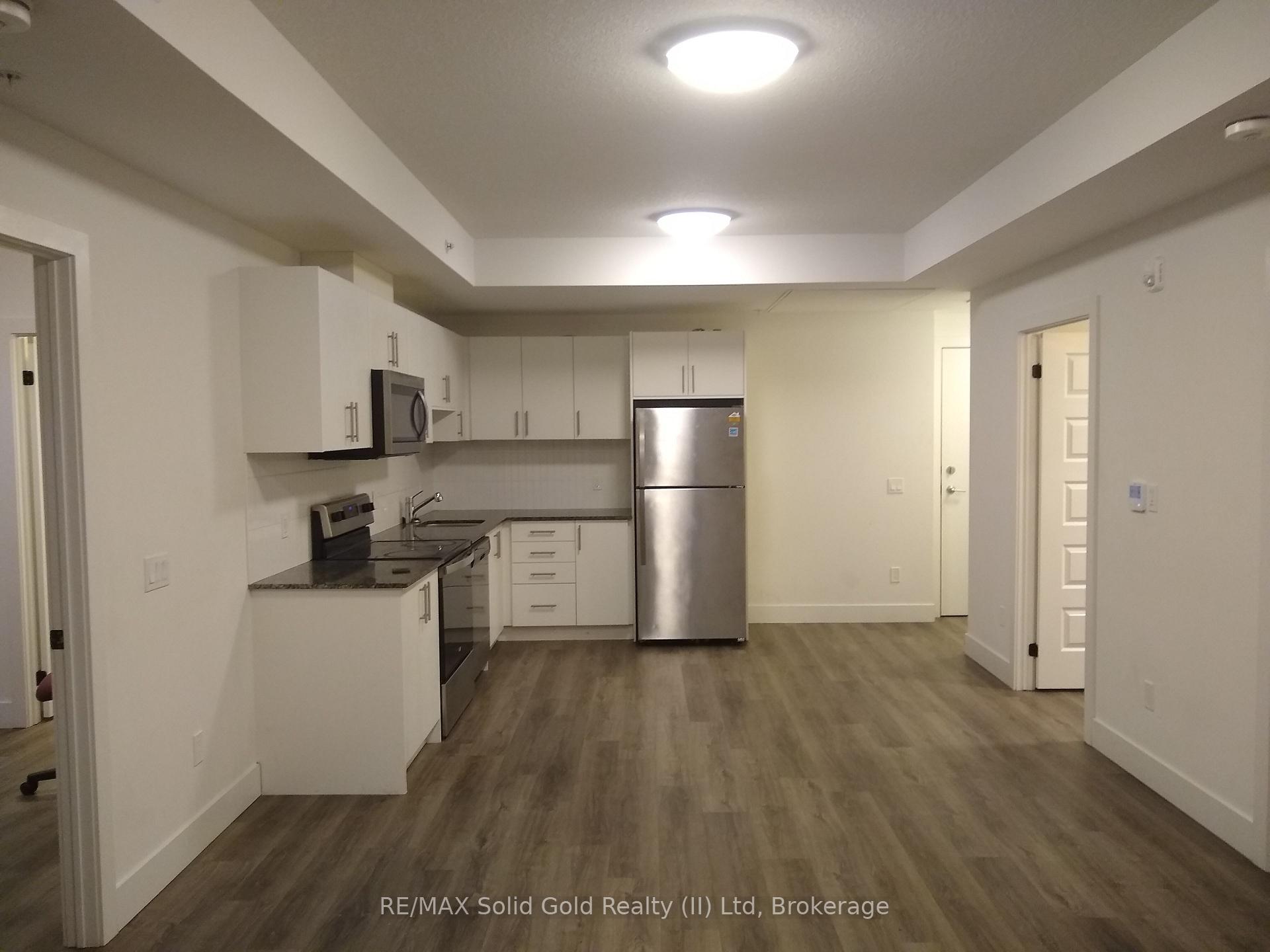 Photo 2 of Unit 404, 107 Roger Street, Waterloo — HOMEH