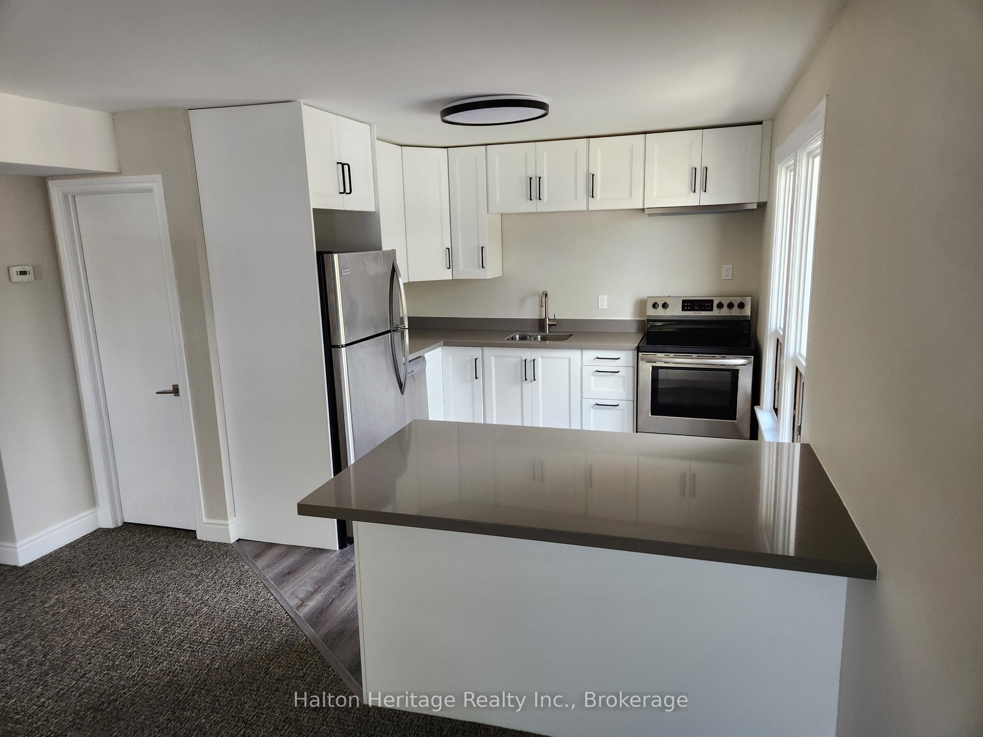 Photo 2 of Unit 2, 620 Brant Street, Burlington, Brant — HOMEH