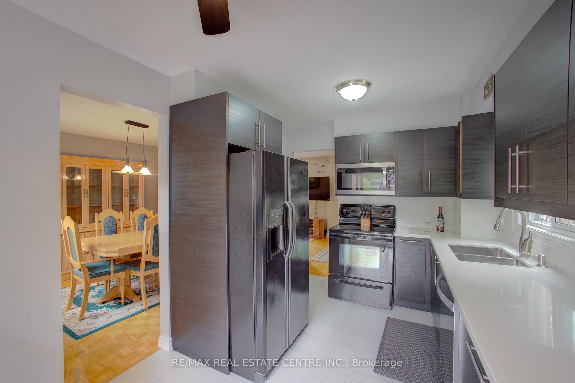 Photo 3 of 57 Ecclestone Drive, Brampton, Brampton West — HOMEH