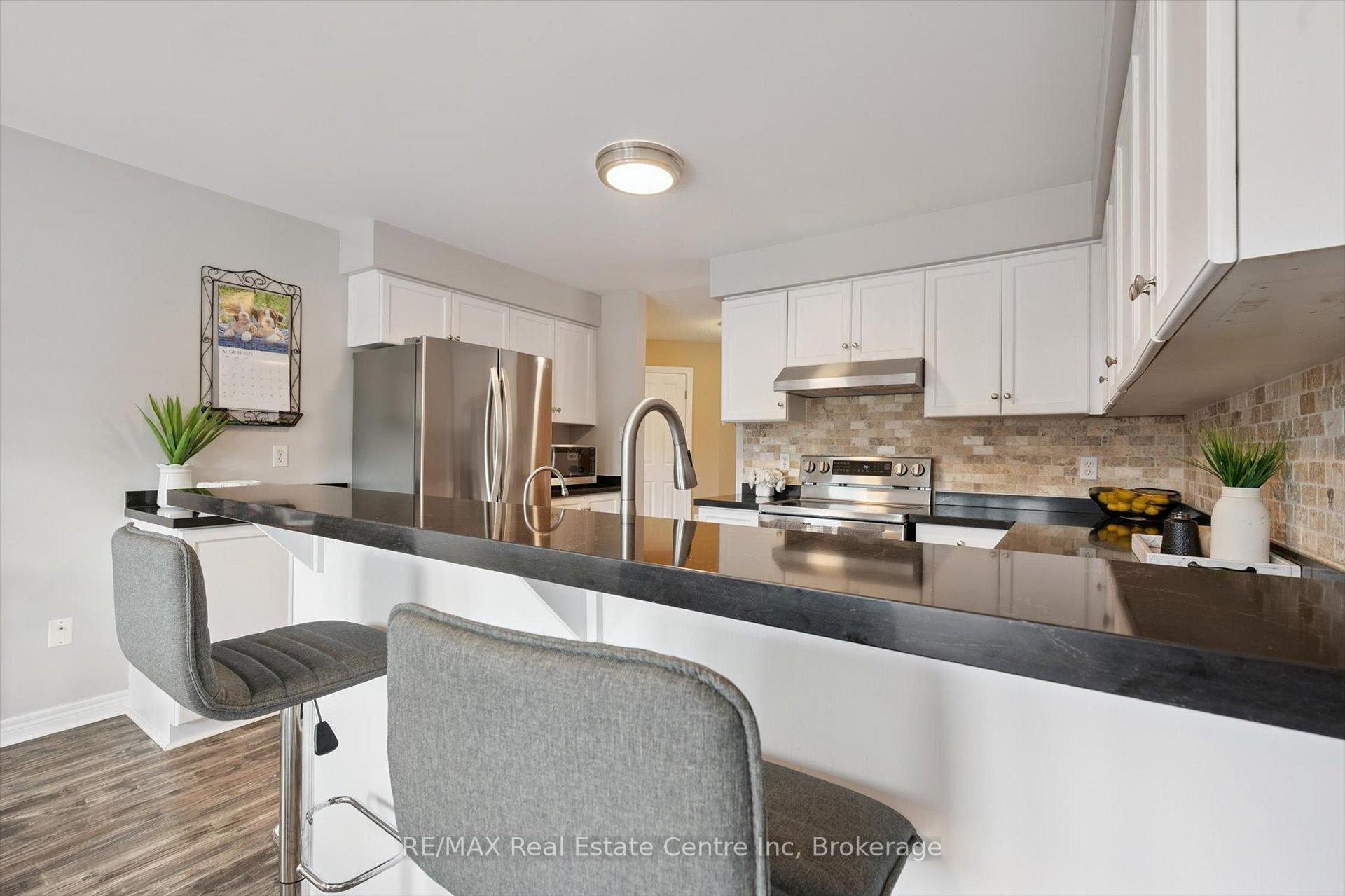 Photo 10 of 98 Schroder Crescent, Guelph, Grange Road — HOMEH