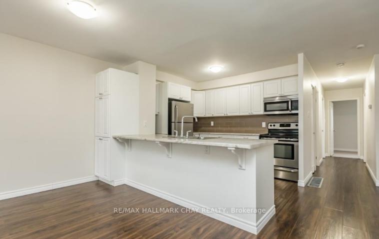 Photo 7 of Unit main level, 97 Daphne Crescent, Barrie, Cundles East — HOMEH