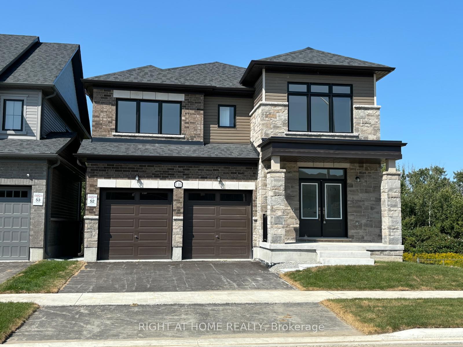 Front of 116 Thicketwood Ave