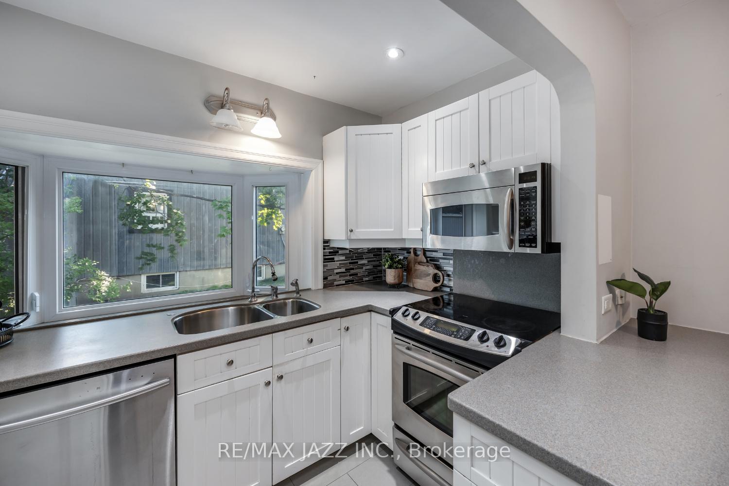 Photo 4 of 59 Harmony Road N, Oshawa, Eastdale — HOMEH