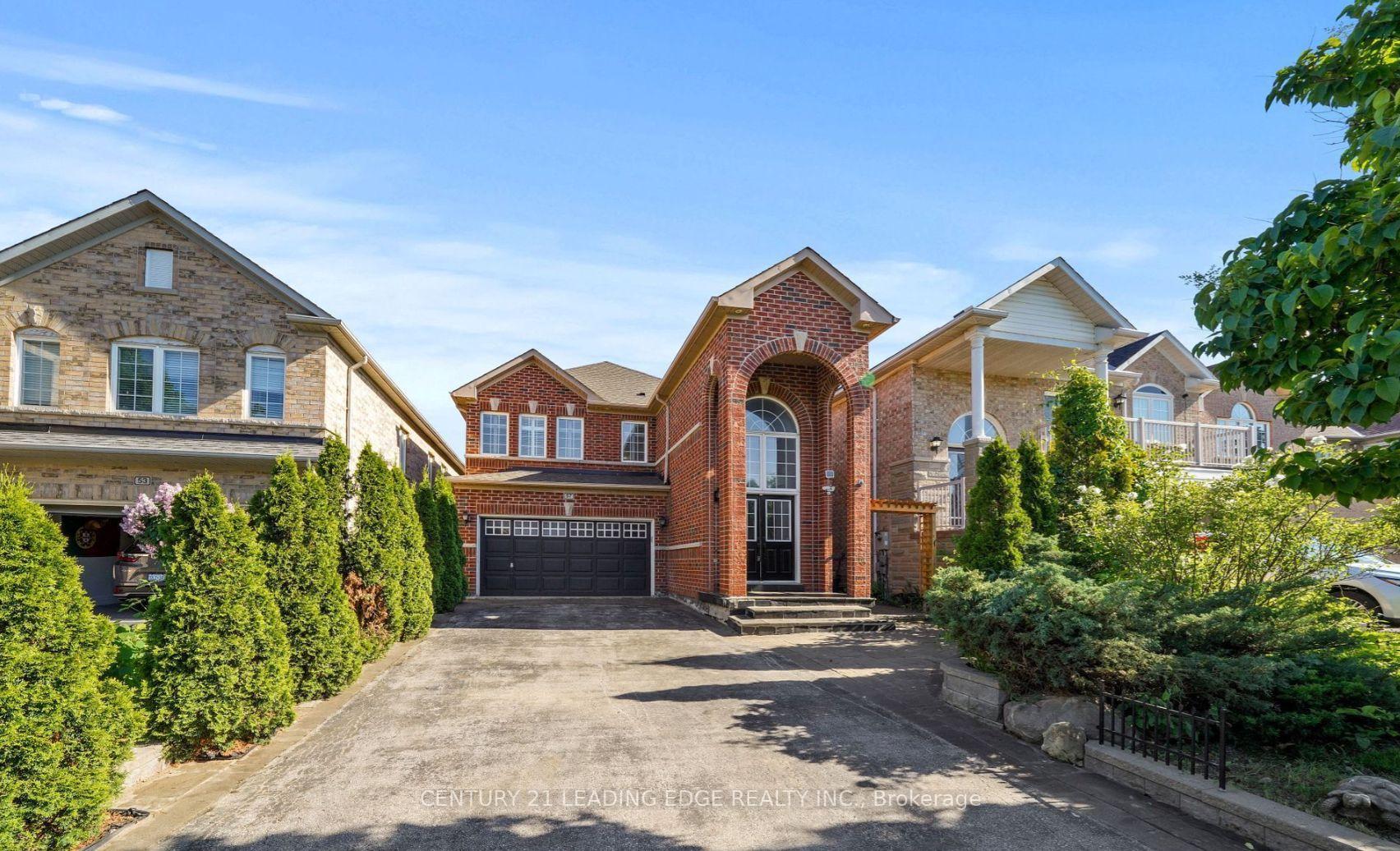Front of 57 Queen Isabella Crescent N