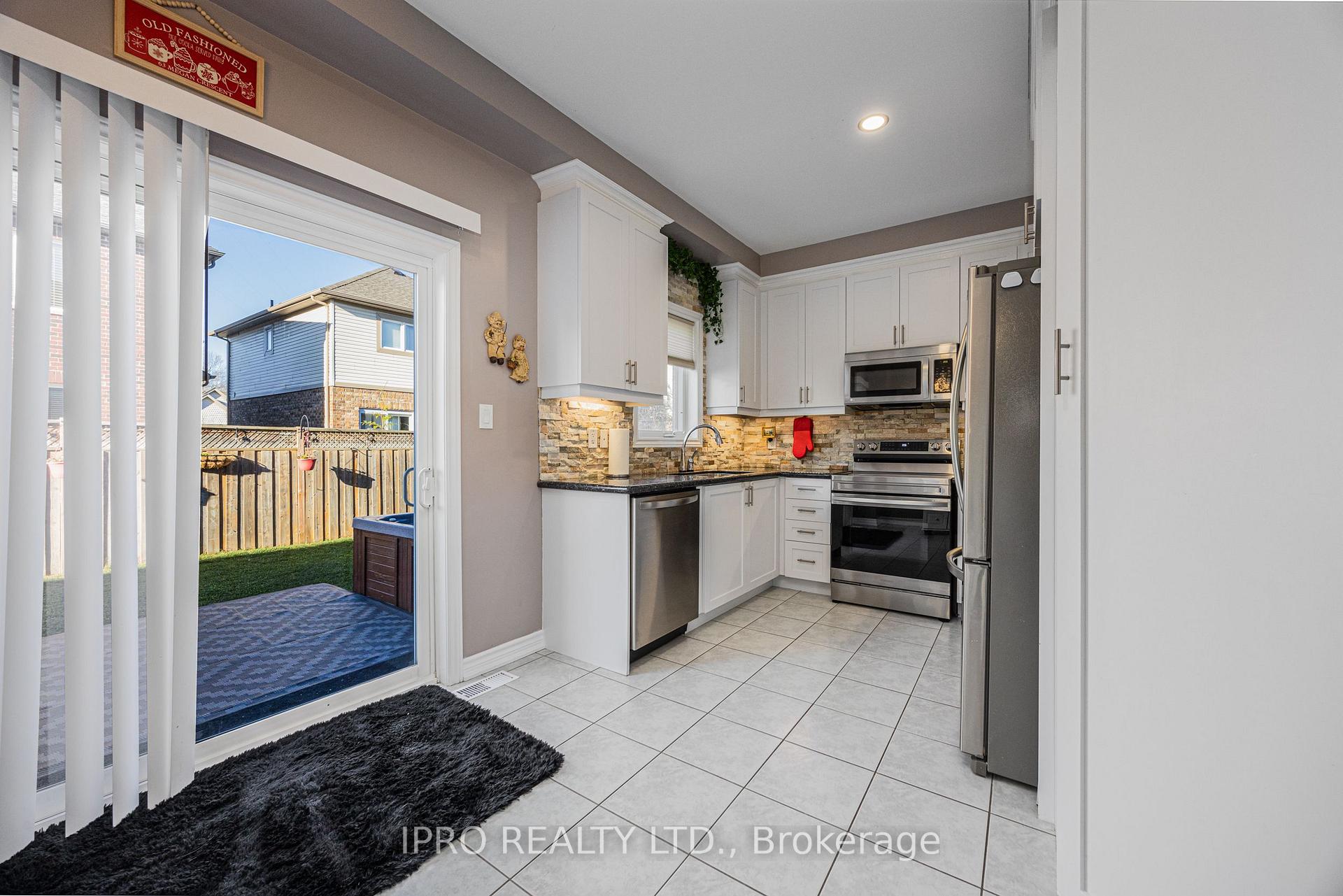 Photo 9 of 63 Megan Crescent, Barrie, 400 West — HOMEH