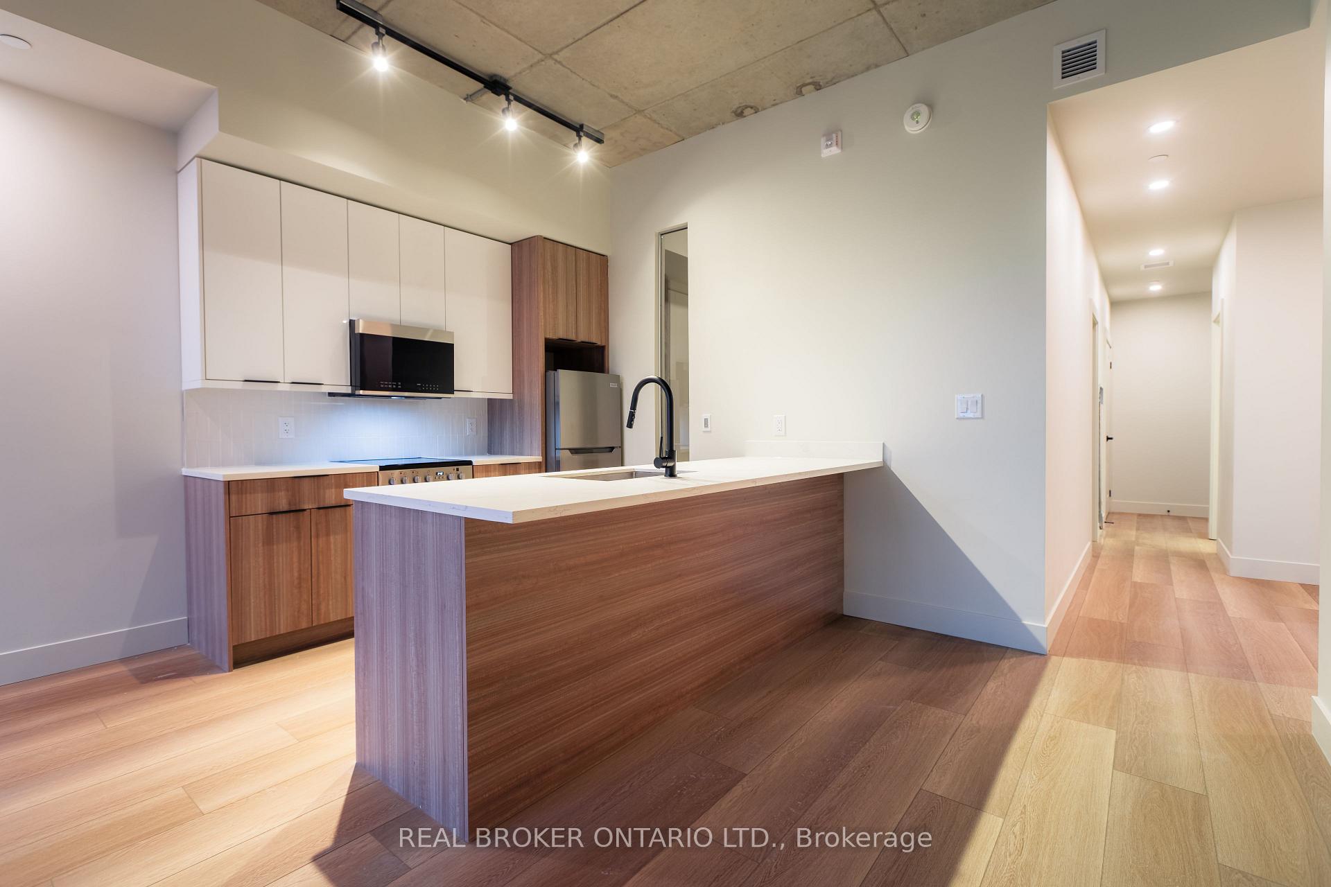 Photo 2 of Unit 408, 24 Augusta Street, Hamilton, Corktown — HOMEH