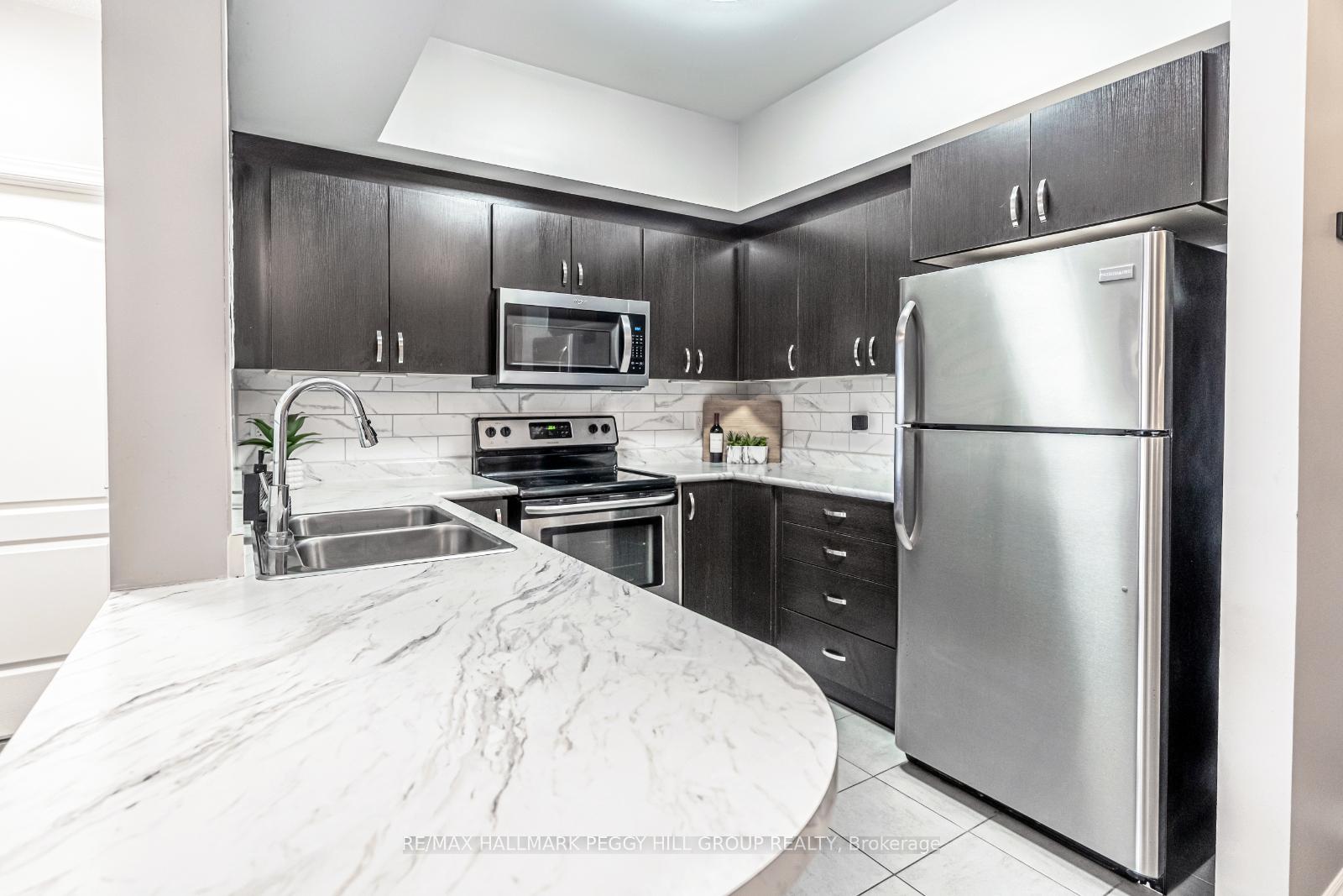 Photo 5 of Unit 309, 720 Yonge Street, Barrie, Painswick South — HOMEH