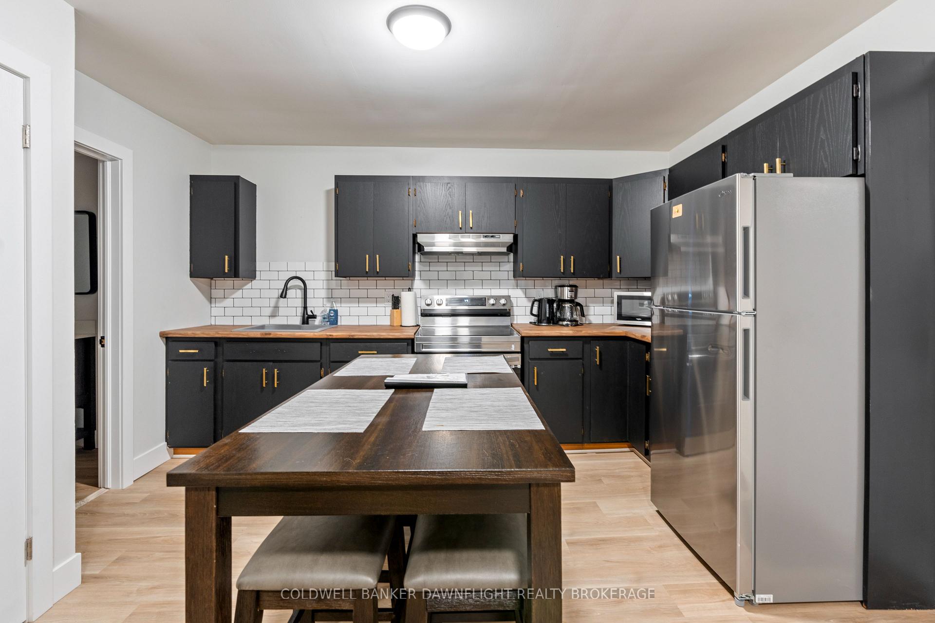 Photo 6 of Unit 2, 383 Main Street S, South Huron, Exeter — HOMEH