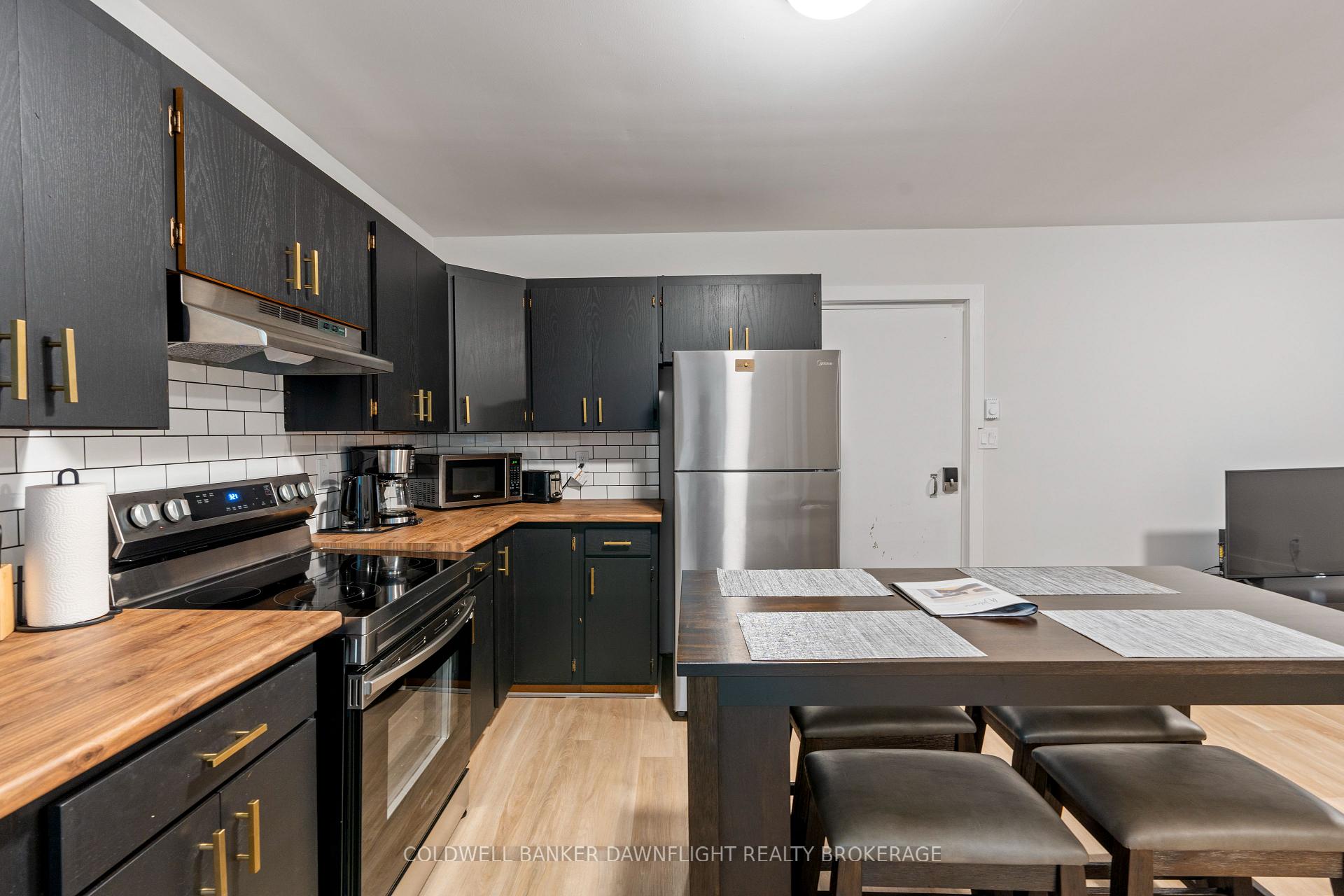 Photo 3 of Unit 2, 383 Main Street S, South Huron, Exeter — HOMEH