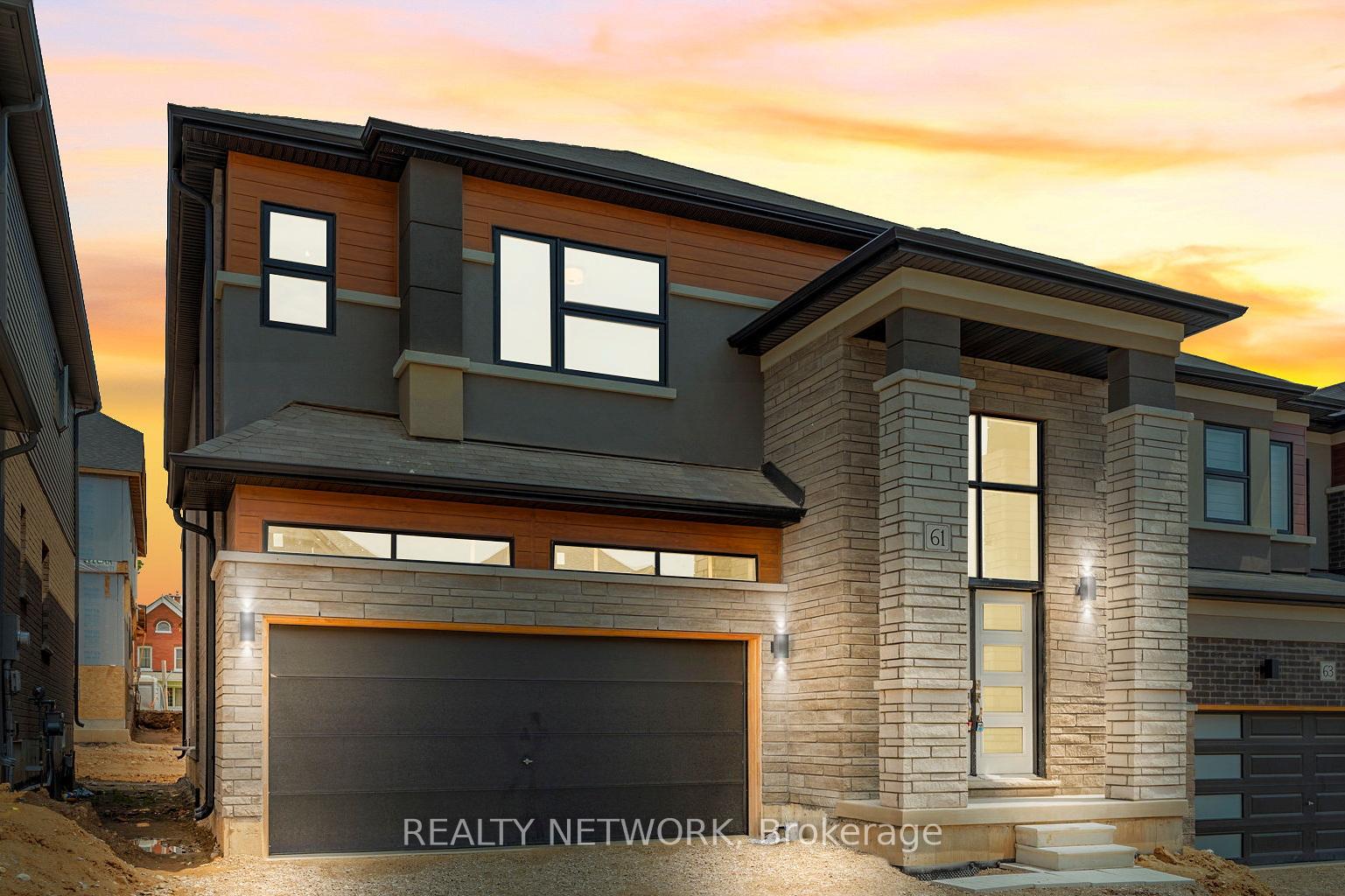 Front of 61 George Brier Drive E