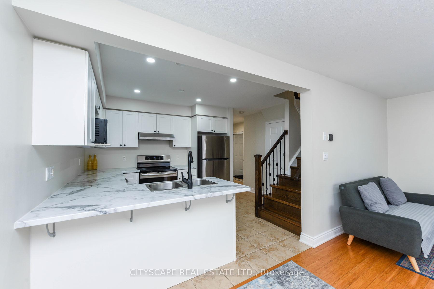 Photo 2 of Unit 35, 31 Schroder Crescent, Guelph, Grange Road — HOMEH