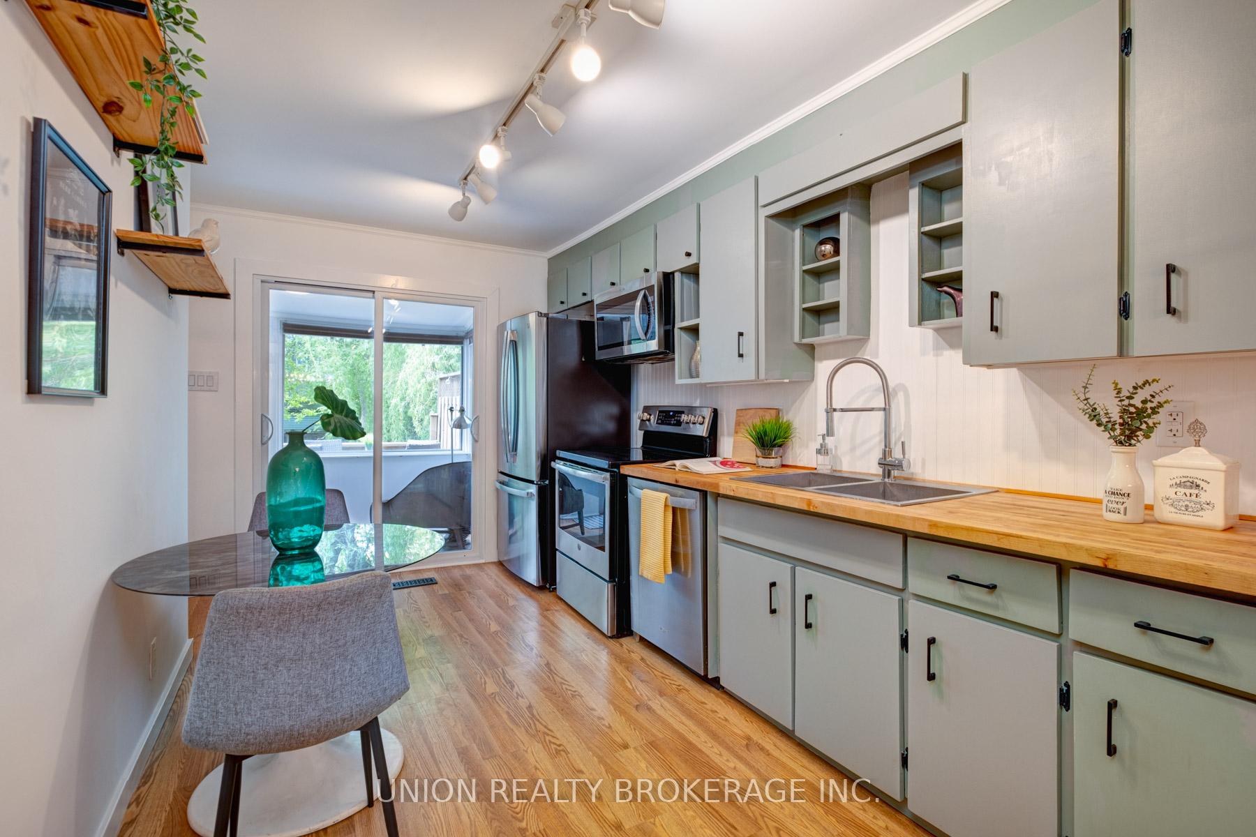Photo 6 of 162 Rhodes Avenue, Toronto, Greenwood-Coxwell — HOMEH