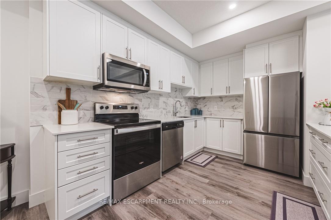 Photo 5 of Unit 310, 1201 Lackner Place, Kitchener — HOMEH