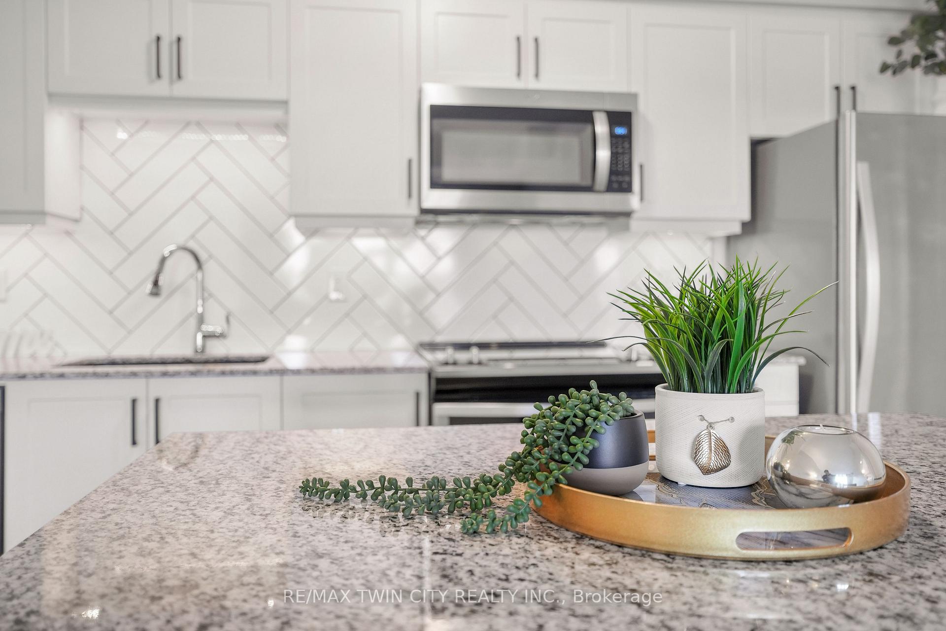 Photo 5 of Unit 403, 195 Commonwealth Street, Kitchener — HOMEH